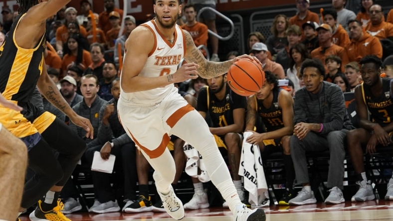 Dec 27, 2022; Austin, Texas, USA; Texas Longhorns forward Timmy Allen (0) drives to the basket during the first half against the Texas A&M-Commerce Lions at Moody Center. Mandatory Credit: Scott Wachter-USA TODAY Sports