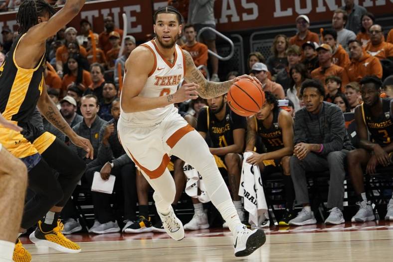 Dec 27, 2022; Austin, Texas, USA; Texas Longhorns forward Timmy Allen (0) drives to the basket during the first half against the Texas A&M-Commerce Lions at Moody Center. Mandatory Credit: Scott Wachter-USA TODAY Sports