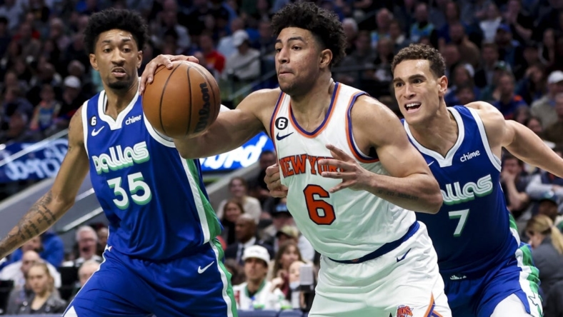 Dec 27, 2022; Dallas, Texas, USA;  New York Knicks guard Quentin Grimes (6) looks to score as Dallas Mavericks center Dwight Powell (7) and Dallas Mavericks forward Christian Wood (35) defend during the second quarter at American Airlines Center. Mandatory Credit: Kevin Jairaj-USA TODAY Sports