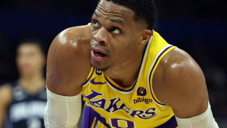 Dec 27, 2022; Orlando, Florida, USA; Los Angeles Lakers guard Russell Westbrook (0) looks on against the Orlando Magic during the second half at Amway Center. Mandatory Credit: Kim Klement-USA TODAY Sports