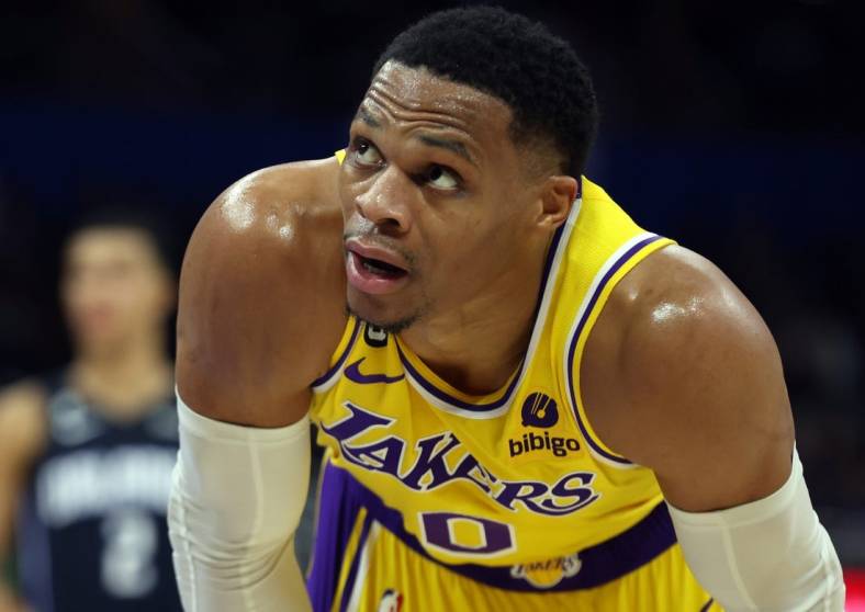 Dec 27, 2022; Orlando, Florida, USA; Los Angeles Lakers guard Russell Westbrook (0) looks on against the Orlando Magic during the second half at Amway Center. Mandatory Credit: Kim Klement-USA TODAY Sports