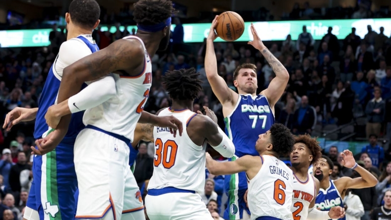 Dec 27, 2022; Dallas, Texas, USA;  Dallas Mavericks guard Luka Doncic (77) scores near the end of the fourth quarter against the New York Knicks at American Airlines Center. Mandatory Credit: Kevin Jairaj-USA TODAY Sports