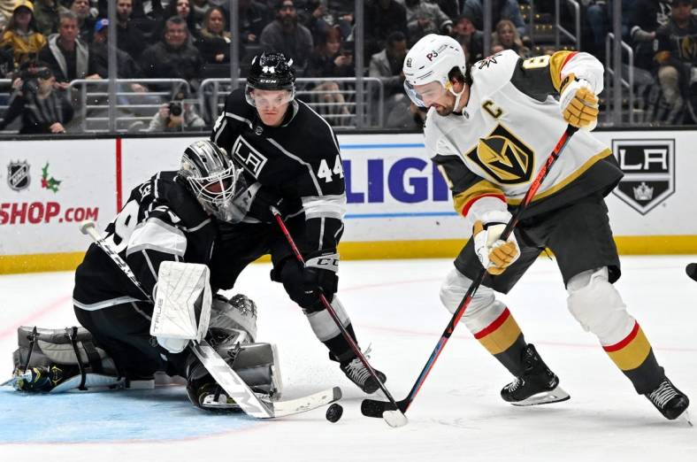 Dec 27, 2022; Los Angeles, California, USA; Los Angeles Kings goaltender Pheonix Copley (29) and defenseman Mikey Anderson (44) defend a shot on goal by Vegas Golden Knights right wing Mark Stone (61) in the third period at Crypto.com Arena. Mandatory Credit: Jayne Kamin-Oncea-USA TODAY Sports