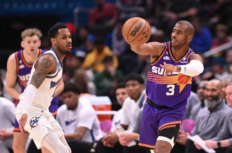 Dec 28, 2022; Washington, District of Columbia, USA;  Phoenix Suns guard Chris Paul (3) passes as during the first half against the Washington Wizards at Capital One Arena. Mandatory Credit: Tommy Gilligan-USA TODAY Sports