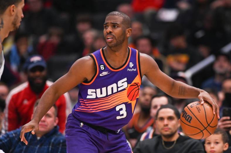 Dec 28, 2022; Washington, District of Columbia, USA;  Phoenix Suns guard Chris Paul (3) looks to pass during the second half H| at Capital One Arena. Mandatory Credit: Tommy Gilligan-USA TODAY Sports