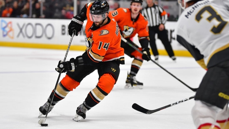 Dec 28, 2022; Anaheim, California, USA; Anaheim Ducks forward Adam Henrique (14) moves in for a shot against the Vegas Golden Knights during the second period at Honda Center. Mandatory Credit: Gary A. Vasquez-USA TODAY Sports