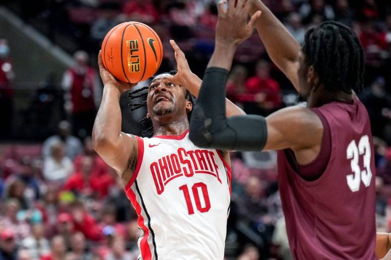 Dec 29, 2022; Columbus, Ohio, United States;  Ohio State Buckeyes forward Brice Sensabaugh (10) makes a shot attempt while defended by Alabama A&M Bulldogs center Olisa Blaise Akonobi (33) during the second half of the NCAA division I basketball game between the Ohio State Buckeyes and the Alabama A&M Bulldogs at Value City Arena. Mandatory Credit: Joseph Scheller-The Columbus Dispatch

Basketball Ceb Mbk Alabama Alabama A M At Ohio State