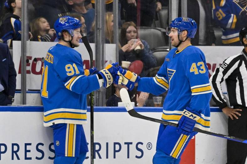 Dec 31, 2022; St. Louis, Missouri, USA; St. Louis Blues defenseman Calle Rosen (43) is congratulated by right wing Vladimir Tarasenko (91) after scoring against the Minnesota Wild during the first period at Enterprise Center. Mandatory Credit: Jeff Curry-USA TODAY Sports