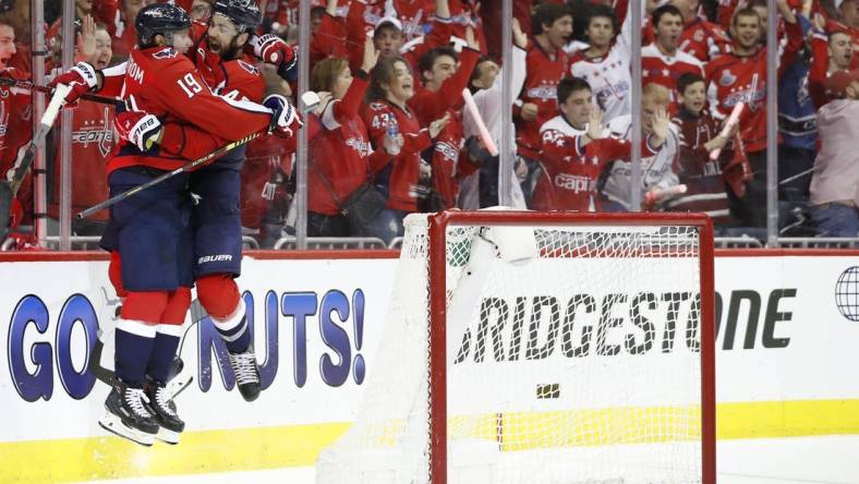 Apr 13, 2019; Washington, DC, USA; Washington Capitals right wing Tom Wilson (43) celebrates with Capitals center Nicklas Backstrom (19) after scoring a goal against the Carolina Hurricanes in the third period in game two of the first round of the 2019 Stanley Cup Playoffs at Capital One Arena. The Capitals won 4-3 in overtime. Mandatory Credit: Geoff Burke-USA TODAY Sports