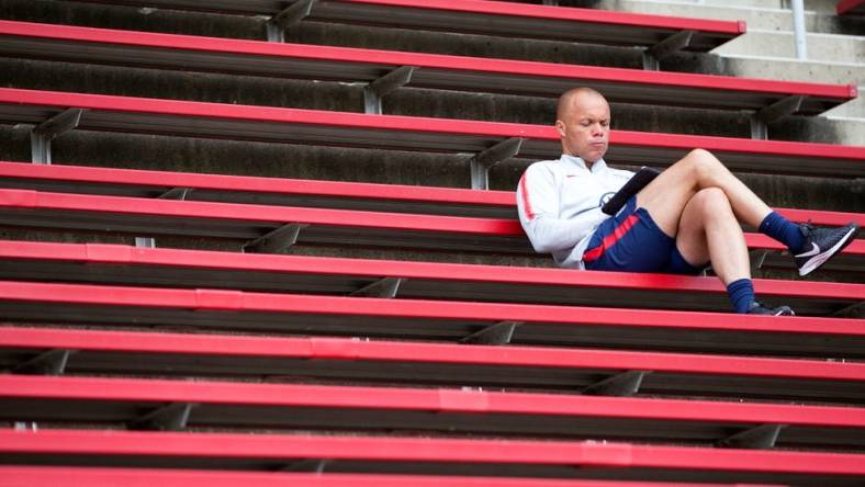 Earnie Stewart, a former U.S. national team player and the current general manager of the U.S. Men's national team, sits in the stands while The U.S. Men's National Team trains at Nippert Stadium Friday, June 7, 2019.

Usmen6