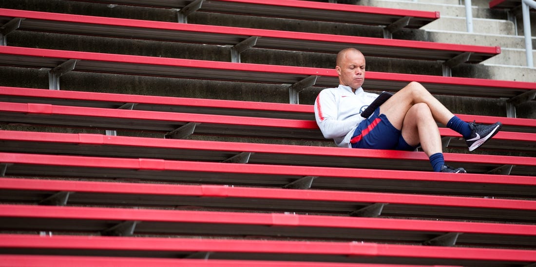 Earnie Stewart, a former U.S. national team player and the current general manager of the U.S. Men's national team, sits in the stands while The U.S. Men's National Team trains at Nippert Stadium Friday, June 7, 2019.

Usmen6