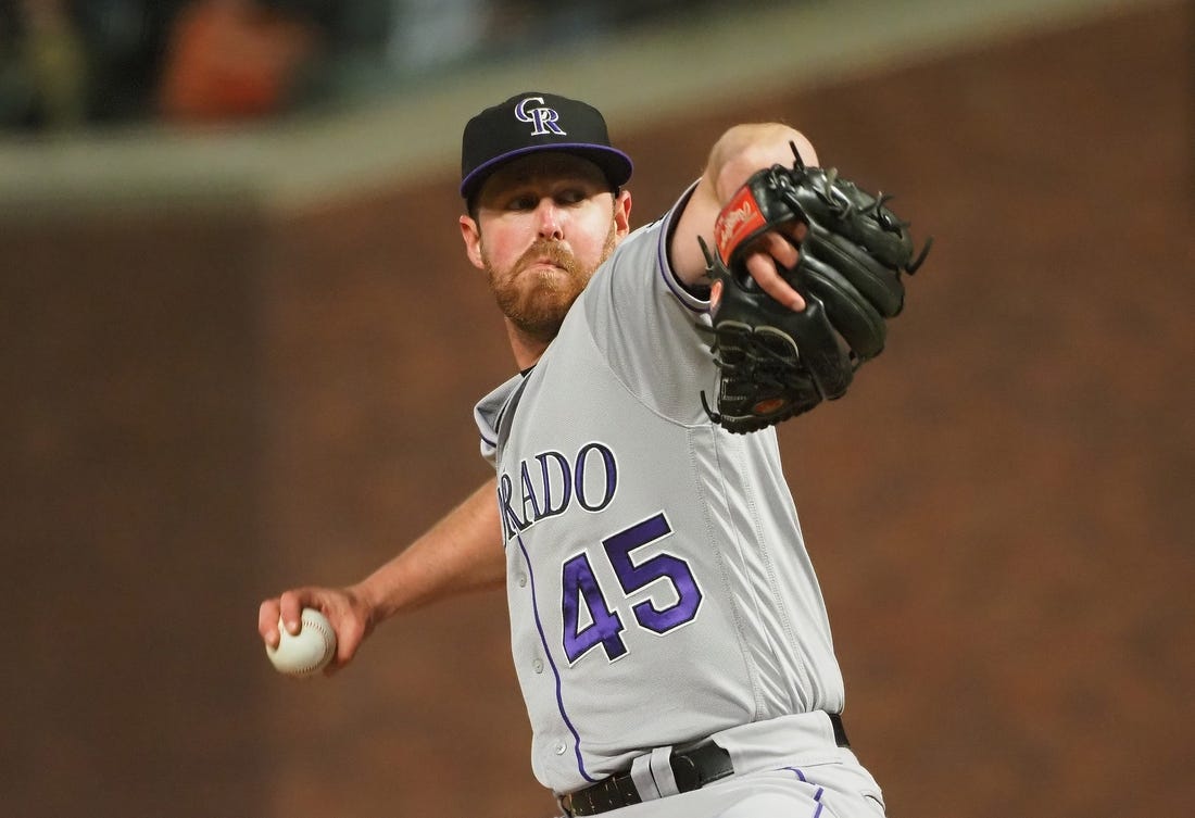 Jun 24, 2019; San Francisco, CA, USA; Colorado Rockies relief pitcher Scott Oberg (45) pitches the ball against the San Francisco Giants during the eighth inning at Oracle Park. Mandatory Credit: Kelley L Cox-USA TODAY Sports