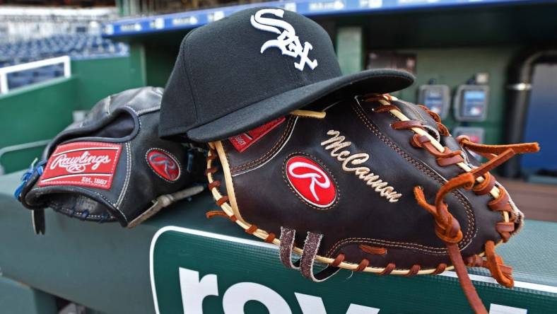 Jul 17, 2019; Kansas City, MO, USA; A general view of Chicago White Sox gloves and cap, prior to a game against the Kansas City Royals at Kauffman Stadium. Mandatory Credit: Peter G. Aiken/USA TODAY Sports