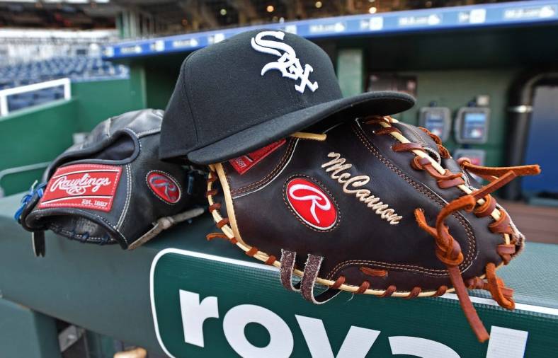 Jul 17, 2019; Kansas City, MO, USA; A general view of Chicago White Sox gloves and cap, prior to a game against the Kansas City Royals at Kauffman Stadium. Mandatory Credit: Peter G. Aiken/USA TODAY Sports
