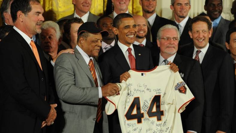 2010 World Series champion San Francisco Giants visit the White House and President Barack Obama Monday July 25, 2011. President Obama holds a gift jersey with Giants legend Willie Mays on his right and General Manager Brian Sabean on his near left and team president Larry Baer second left. Team manager Bruce Bochy is at far left. 

Xxx 3152 Jpg S Bbn Usa