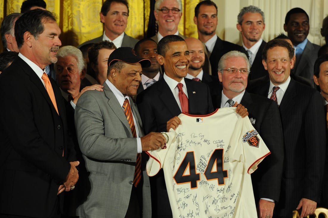 2010 World Series champion San Francisco Giants visit the White House and President Barack Obama Monday July 25, 2011. President Obama holds a gift jersey with Giants legend Willie Mays on his right and General Manager Brian Sabean on his near left and team president Larry Baer second left. Team manager Bruce Bochy is at far left. 

Xxx 3152 Jpg S Bbn Usa