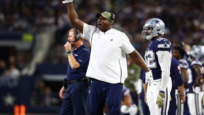 Nov 10, 2019; Arlington, TX, USA; Dallas Cowboys defensive tackles coach Leon Lett motions from the sidelines against the Minnesota Vikings at AT&T Stadium. Mandatory Credit: Matthew Emmons-USA TODAY Sports