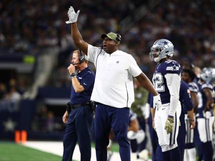 Nov 10, 2019; Arlington, TX, USA; Dallas Cowboys defensive tackles coach Leon Lett motions from the sidelines against the Minnesota Vikings at AT&T Stadium. Mandatory Credit: Matthew Emmons-USA TODAY Sports