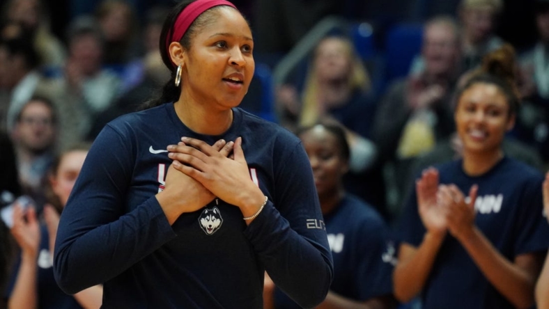 Jan 27, 2020; Hartford, Connecticut, USA; Former UConn Huskies player Maya Moore is honored before the game against the UConn Huskies and 2020 USA Womens National Team at XL Center. Mandatory Credit: David Butler II-USA TODAY Sports