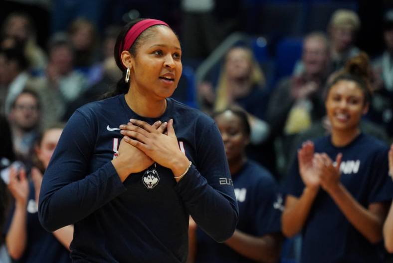 Jan 27, 2020; Hartford, Connecticut, USA; Former UConn Huskies player Maya Moore is honored before the game against the UConn Huskies and 2020 USA Womens National Team at XL Center. Mandatory Credit: David Butler II-USA TODAY Sports