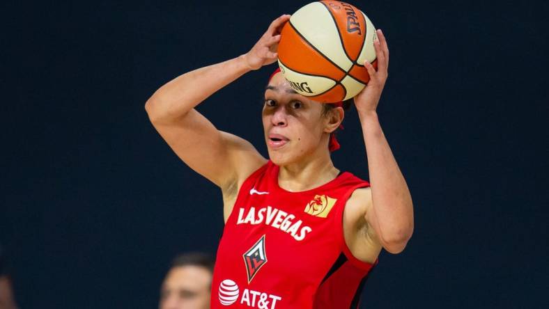 Sep 24, 2020; Bradenton, Florida, USA; Las Vegas Aces forward Dearica Hamby (5) looks to pass during game 3 of the WNBA semi-finals against the Connecticut Sun at Feld Entertainment. Mandatory Credit: Mary Holt-USA TODAY Sports