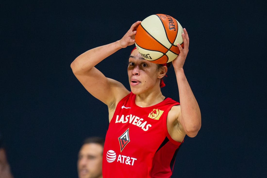 Sep 24, 2020; Bradenton, Florida, USA; Las Vegas Aces forward Dearica Hamby (5) looks to pass during game 3 of the WNBA semi-finals against the Connecticut Sun at Feld Entertainment. Mandatory Credit: Mary Holt-USA TODAY Sports