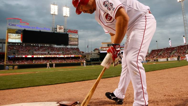 (File photo) Scott Rolen takes to the on-deck circle against the St. Louis Cardinals at Great American Ball Park.