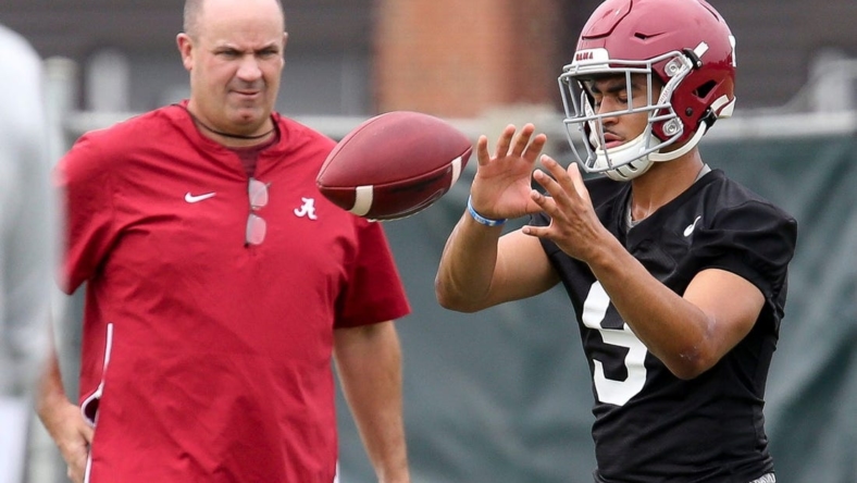 New offensive coordinator Bill O'Brien watches quarterback Bryce Young take a snap during practice. The Alabama Crimson Tide opened practice for the 2021 season as they prepare to defend the 2020 National Championship Friday, Aug. 6, 2021. [Staff Photo/Gary Cosby Jr.]

Alabama First Practice