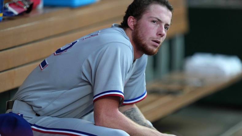 Sep 6, 2021; Anaheim, California, USA;  Texas Rangers starting pitcher A.J. Alexy (62) watches from the dugout in the second inning against the Los Angeles Angels at Angel Stadium. Mandatory Credit: Kirby Lee-USA TODAY Sports