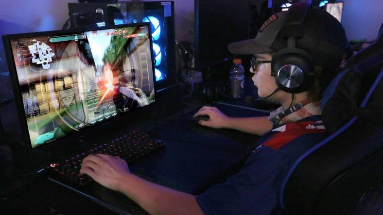 Hutchinson Community College esports team member Clayton Huston plays the game 'Valorant' with his teammates against Shelton State Community College Thursday night, Oct. 7, 2021 at HCC.

Hut 101521 Hcc Esports 01