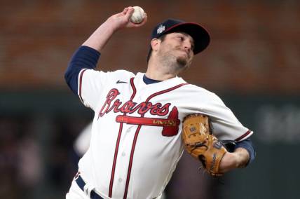 Oct 30, 2021; Atlanta, Georgia, USA; Atlanta Braves relief pitcher Luke Jackson (77) throws against the Houston Astros during the eighth inning of game four of the 2021 World Series at Truist Park. Mandatory Credit: Brett Davis-USA TODAY Sports
