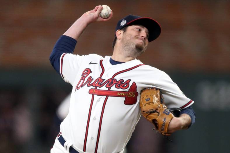 Oct 30, 2021; Atlanta, Georgia, USA; Atlanta Braves relief pitcher Luke Jackson (77) throws against the Houston Astros during the eighth inning of game four of the 2021 World Series at Truist Park. Mandatory Credit: Brett Davis-USA TODAY Sports