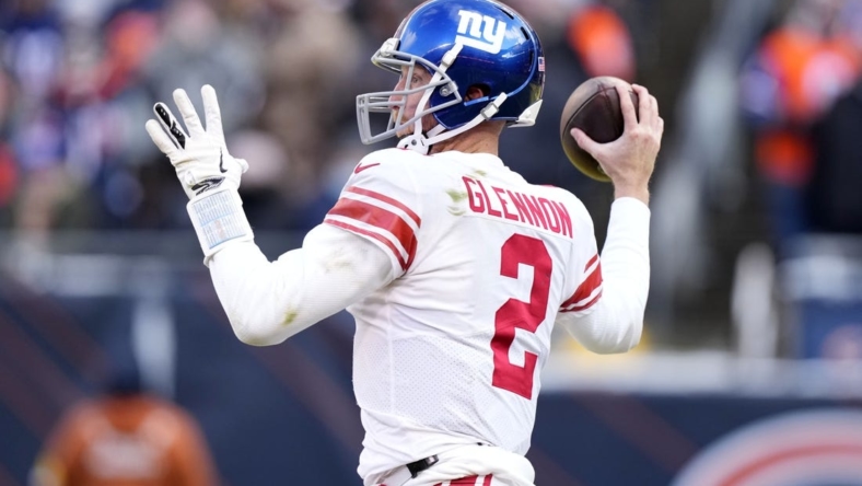 Jan 2, 2022; Chicago, Illinois, USA; New York Giants quarterback Mike Glennon (2) drops back to pass against the Chicago Bears during the second half at Soldier Field. Mandatory Credit: Mike Dinovo-USA TODAY Sports