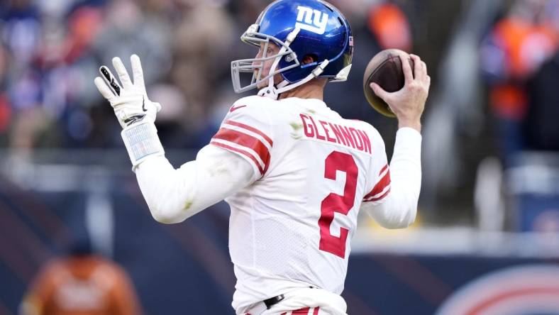 Jan 2, 2022; Chicago, Illinois, USA; New York Giants quarterback Mike Glennon (2) drops back to pass against the Chicago Bears during the second half at Soldier Field. Mandatory Credit: Mike Dinovo-USA TODAY Sports