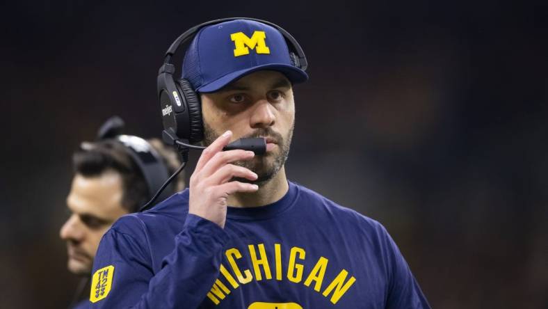 Dec 4, 2021; Indianapolis, IN, USA; Michigan Wolverines quarterbacks coach Matt Weiss against the Iowa Hawkeyes in the Big Ten Conference championship game at Lucas Oil Stadium. Mandatory Credit: Mark J. Rebilas-USA TODAY Sports