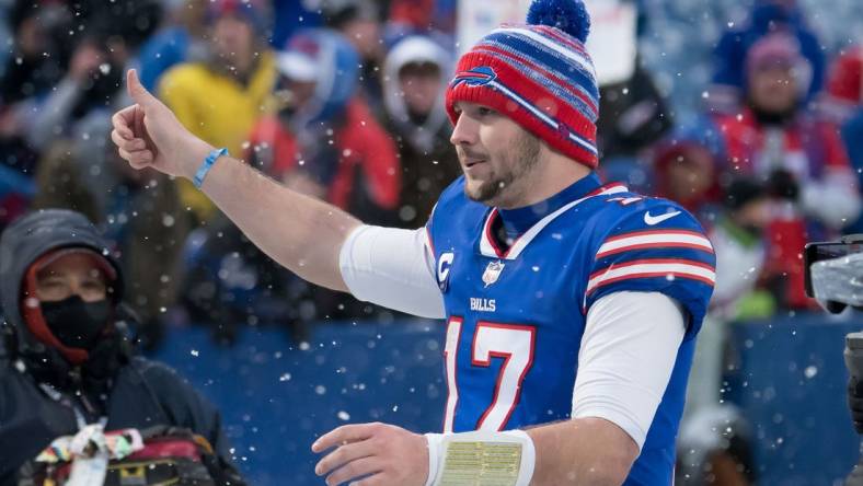 Jan 2, 2022; Orchard Park, New York, USA; Buffalo Bills quarterback Josh Allen (17) gives a thumbs up to the fans   after a game against the Atlanta Falcons at Highmark Stadium. Mandatory Credit: Mark Konezny-USA TODAY Sports