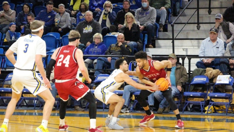 SDSU's Matt Mims defends Denver's Coban Porter during Saturday's Summit League game at Frost Arena.

Img 5787