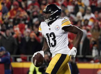Jan 16, 2022; Kansas City, Missouri, USA; Pittsburgh Steelers wide receiver James Washington (13) returns to the sidelines after scoring against the Kansas City Chiefs in an AFC Wild Card playoff football game at GEHA Field at Arrowhead Stadium. Mandatory Credit: Denny Medley-USA TODAY Sports