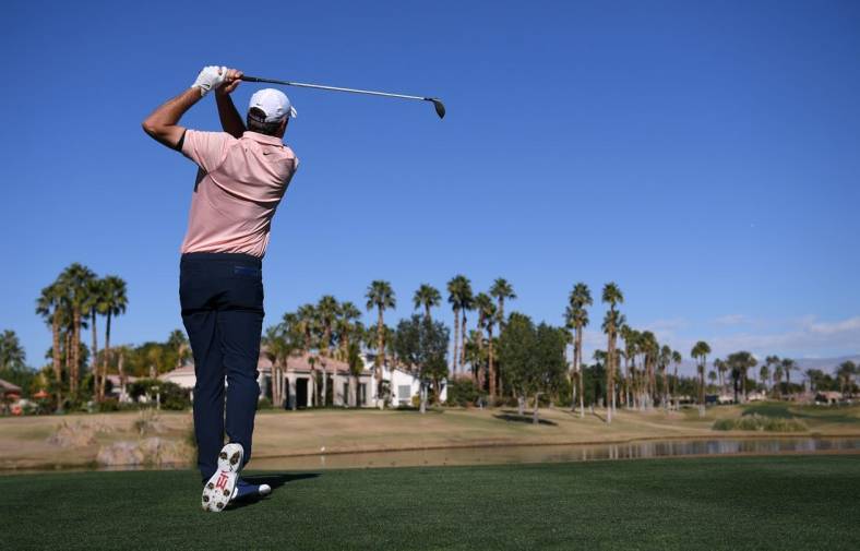 Jan 21, 2022; La Quinta, California, USA; Scottie Scheffler plays his shot from the 13th tee during the second round of the American Express golf tournament at Nicklaus Tournament Course. Mandatory Credit: Orlando Ramirez-USA TODAY Sports