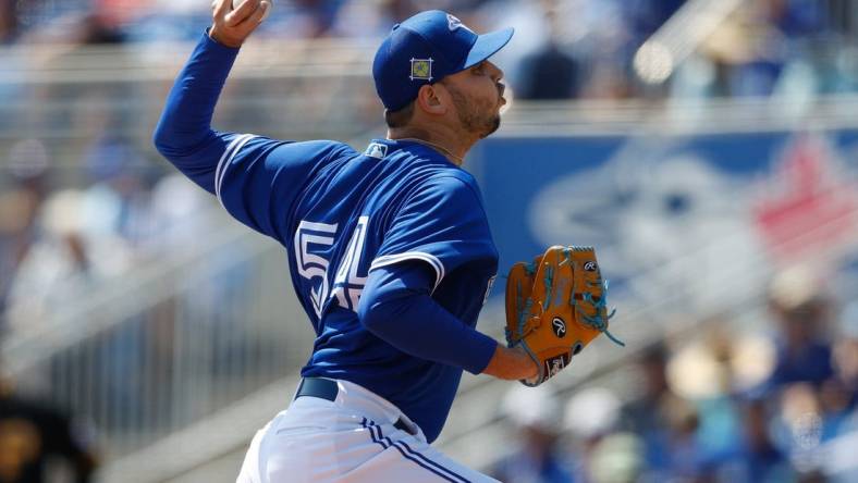 Mar 20, 2022; Dunedin, Florida, USA; Toronto Blue Jays pitcher Tayler Saucedo (54) throws a pitch in the third inning against the Pittsburgh Pirates during spring training at TD Ballpark. Mandatory Credit: Nathan Ray Seebeck-USA TODAY Sports