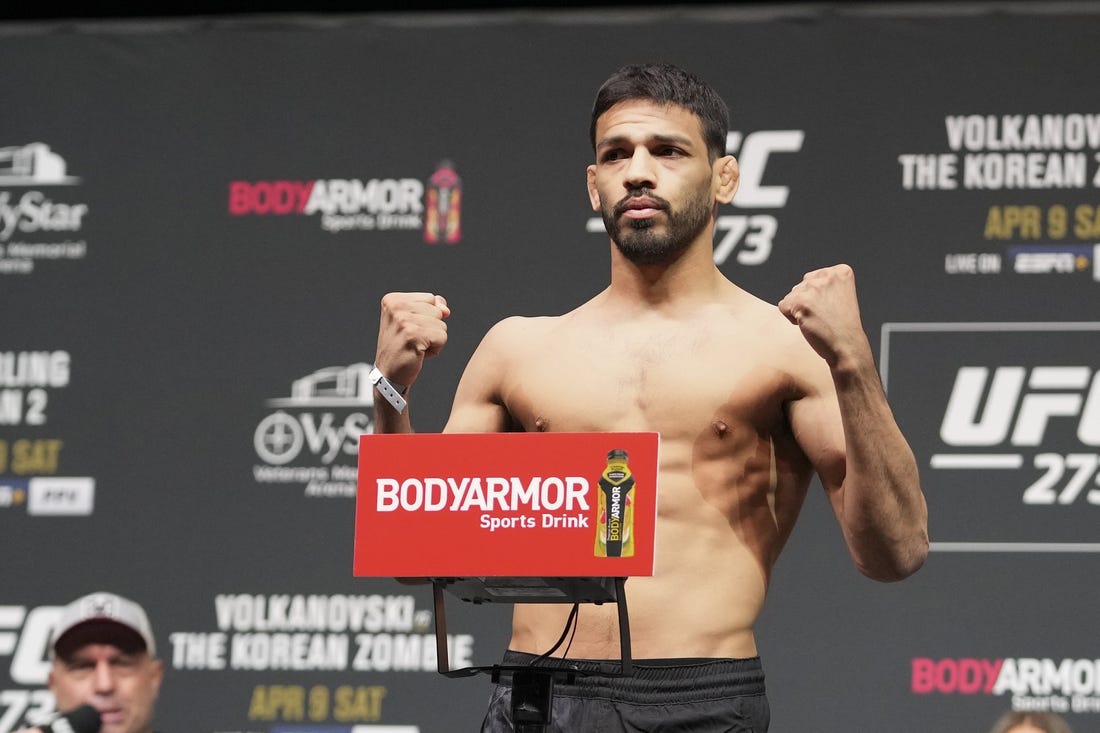 Apr 8, 2022; Jacksonville, FL, USA; Julio Arce on the scale during weigh ins for UFC 273 at VyStar Veterans Memorial Stadium. Mandatory Credit: David Yeazell-USA TODAY Sports