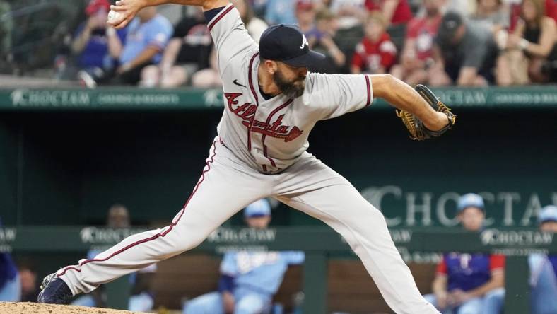 May 1, 2022; Arlington, Texas, USA; Atlanta Braves relief pitcher Darren O'Day (56) throws to the plate during the seventh inning against the Texas Rangers at Globe Life Field. Mandatory Credit: Raymond Carlin III-USA TODAY Sports