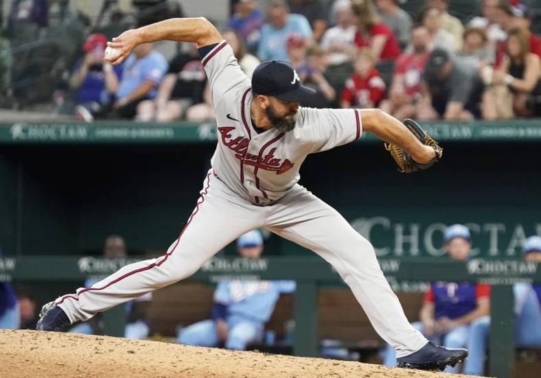 May 1, 2022; Arlington, Texas, USA; Atlanta Braves relief pitcher Darren O'Day (56) throws to the plate during the seventh inning against the Texas Rangers at Globe Life Field. Mandatory Credit: Raymond Carlin III-USA TODAY Sports