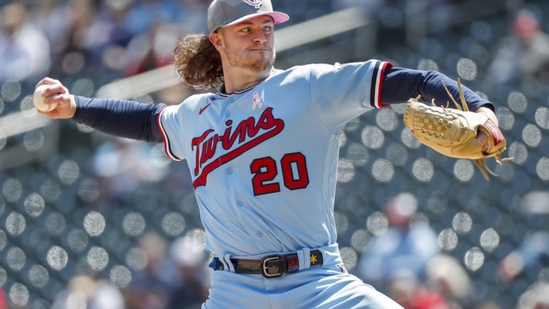 May 8, 2022; Minneapolis, Minnesota, USA; Minnesota Twins starting pitcher Chris Paddack (20) throws to the Oakland Athletics in the second inning at Target Field. Mandatory Credit: Bruce Kluckhohn-USA TODAY Sports