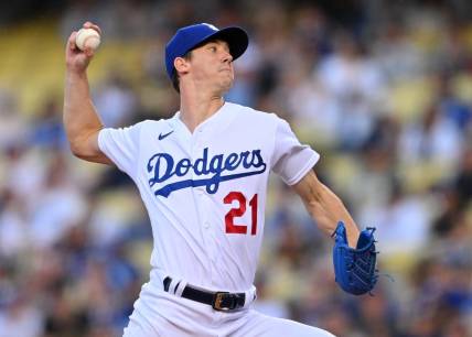 May 13, 2022; Los Angeles, California, USA;  Los Angeles Dodgers starting pitcher Walker Buehler (21) pitches in the second inning against the Philadelphia Phillies at Dodger Stadium. Mandatory Credit: Jayne Kamin-Oncea-USA TODAY Sports