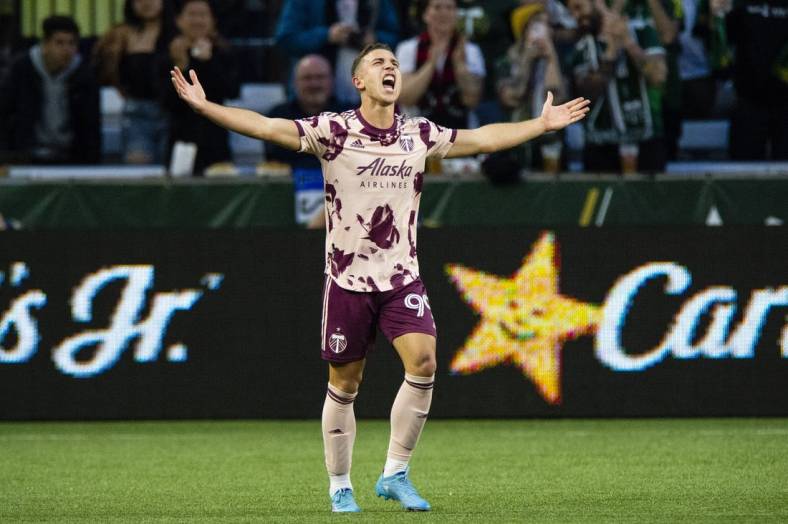 May 14, 2022; Portland, Oregon, USA; Portland Timbers forward Nathan Fogaca (99) celebrates during the second half after scoring a goal against Sporting Kansas City at Providence Park. The Timbers won 7-2.  Mandatory Credit: Troy Wayrynen-USA TODAY Sports