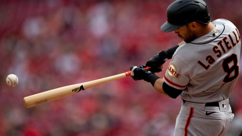 San Francisco Giants second baseman Tommy La Stella (8) hits a double in the first inning of the MLB game between the Cincinnati Reds and the San Francisco Giants at Great American Ball Park in Cincinnati, Saturday, May 28, 2022.

San Francisco Giants At Cincinnati Reds