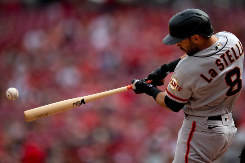 San Francisco Giants second baseman Tommy La Stella (8) hits a double in the first inning of the MLB game between the Cincinnati Reds and the San Francisco Giants at Great American Ball Park in Cincinnati, Saturday, May 28, 2022.

San Francisco Giants At Cincinnati Reds