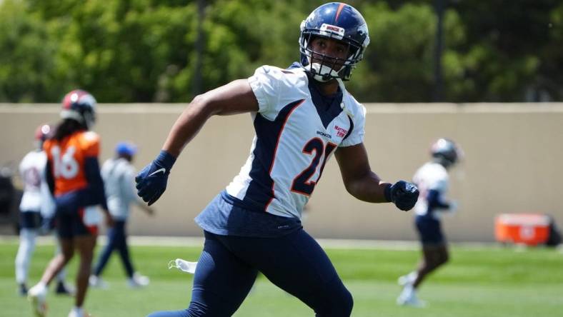 Jun 6, 2022; Englewood, Colorado, USA; Denver Broncos cornerback K'Waun Williams (21) during OTA workouts at the UC Health Training Center. Mandatory Credit: Ron Chenoy-USA TODAY Sports