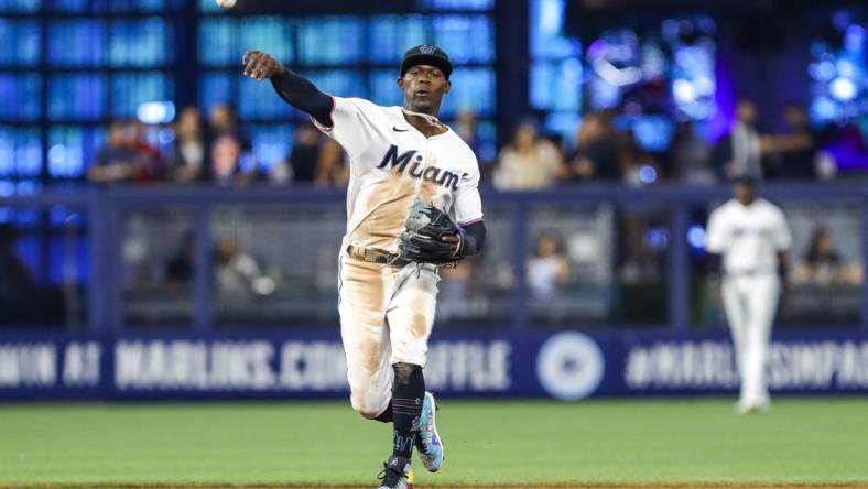 Jun 23, 2022; Miami, Florida, USA; Miami Marlins second baseman Jazz Chisholm Jr. (2) throws to first base to retire Colorado Rockies designated hitter C.J. Cron (not pictured) during the fifth inning at loanDepot Park. Mandatory Credit: Sam Navarro-USA TODAY Sports